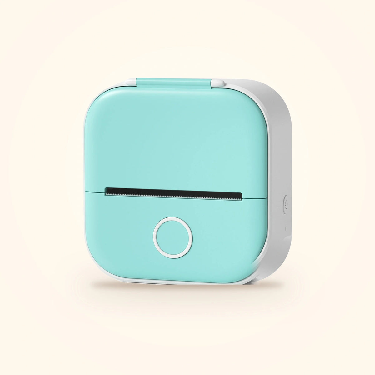 Mini imprimante à stickers du coffret Stickou, coloris tout menthe, posée sur fond crème